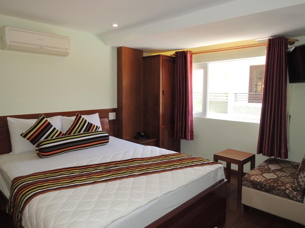 Art Deluxe Hotel Nha Trang Værelse billede