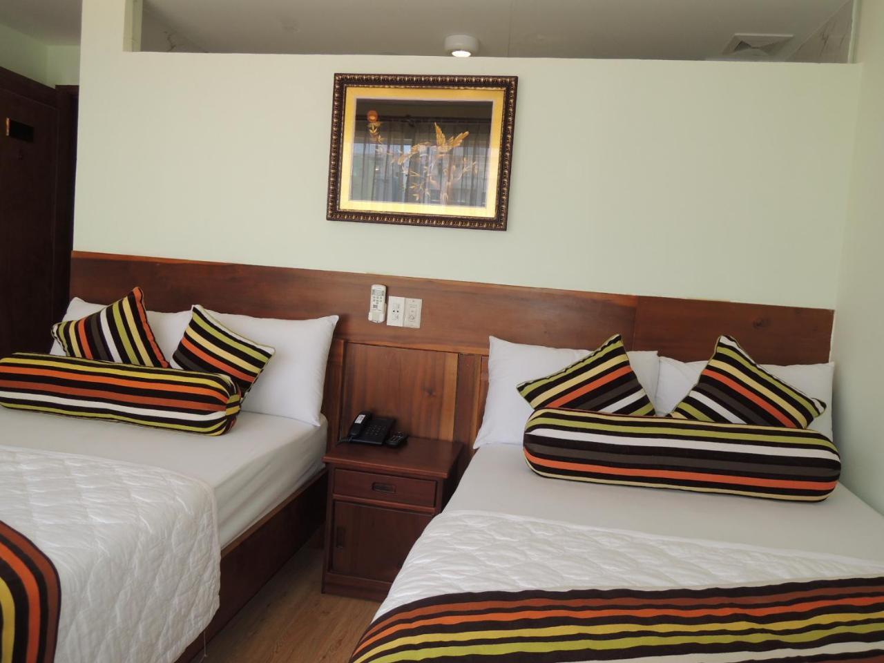 Art Deluxe Hotel Nha Trang Værelse billede